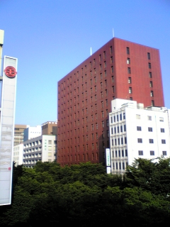 �~�J����